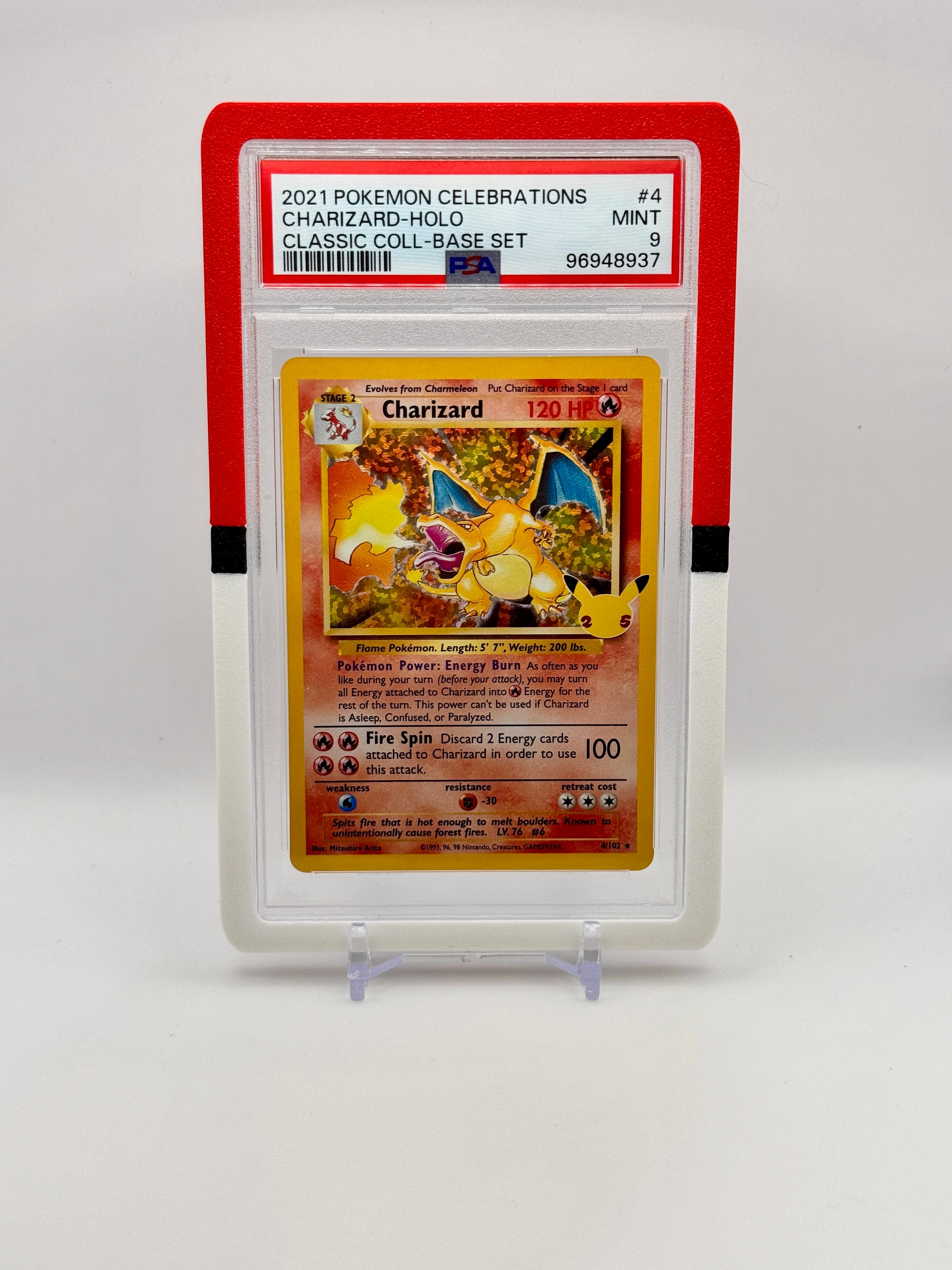Pokémon trading card featuring Charizard in a protective case on a white background